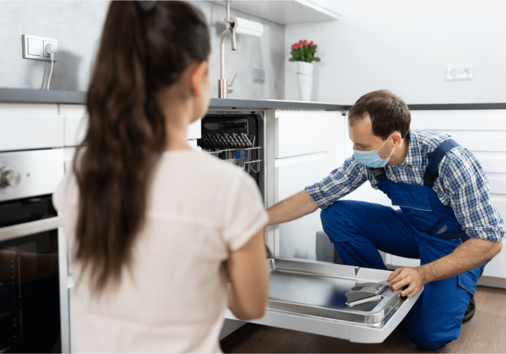 Mr. Appliance Man Fixing Dishwasher